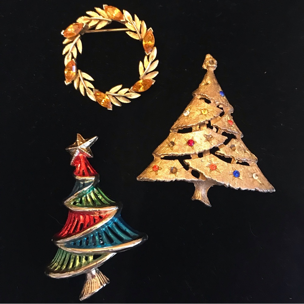3 vintage Christmas themed pins.